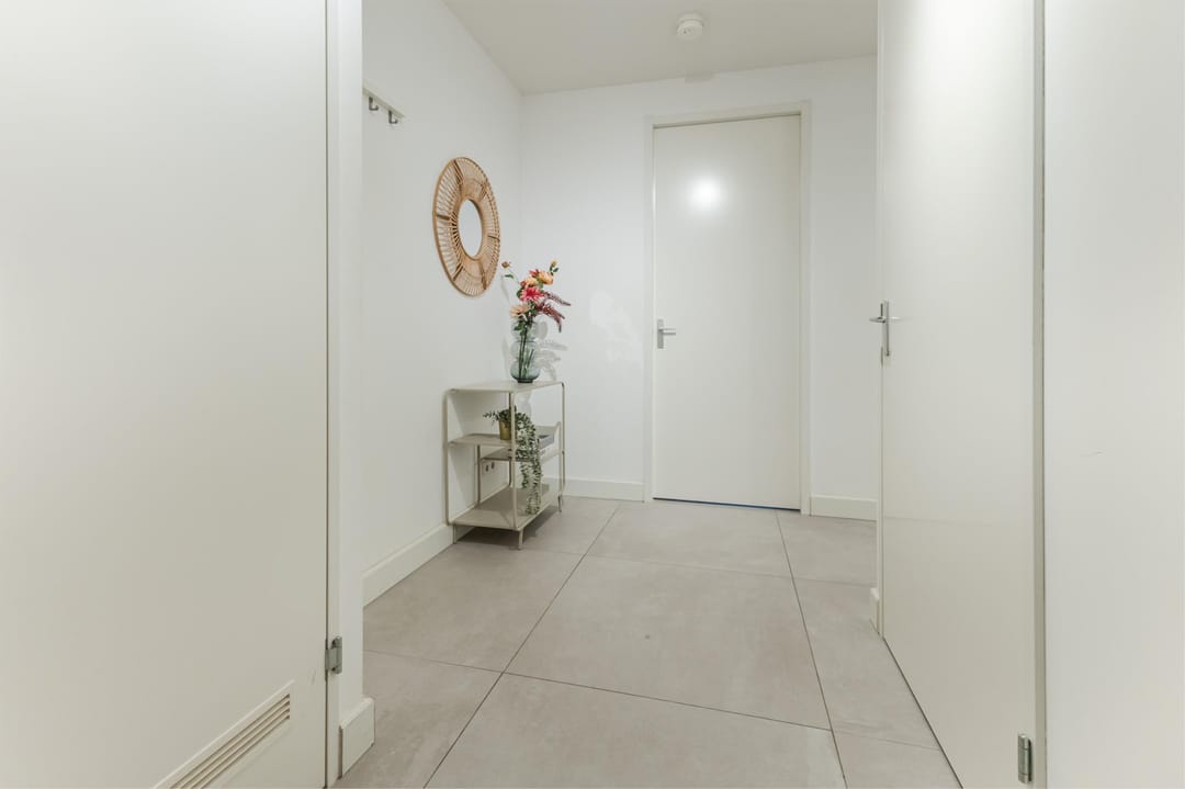 Foto 13 van Van Vollenhovenstraat 3-131