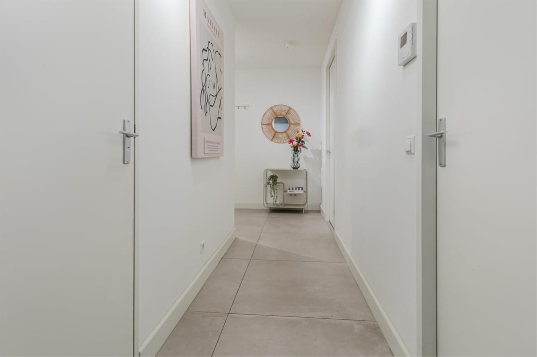 Foto 22 van Van Vollenhovenstraat 3-131