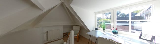 Slaapkamer boven de garage