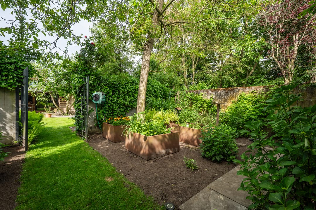 Foto 17 van Land van Ravensteinstraat 54