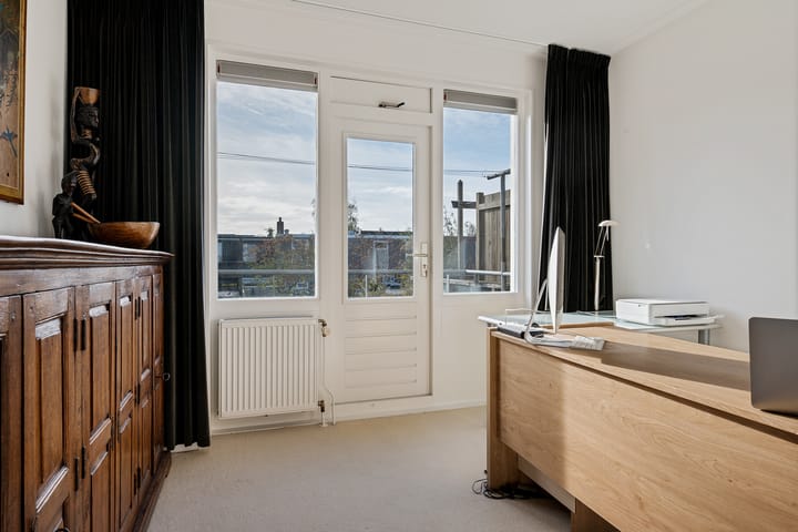 Foto 32 van Raadhuisstraat 11