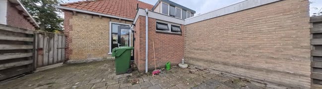 Achtertuin met berging