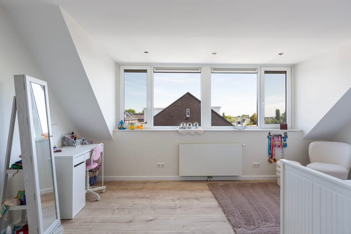 Foto 38 van Burg. Rippingstraat 2-D