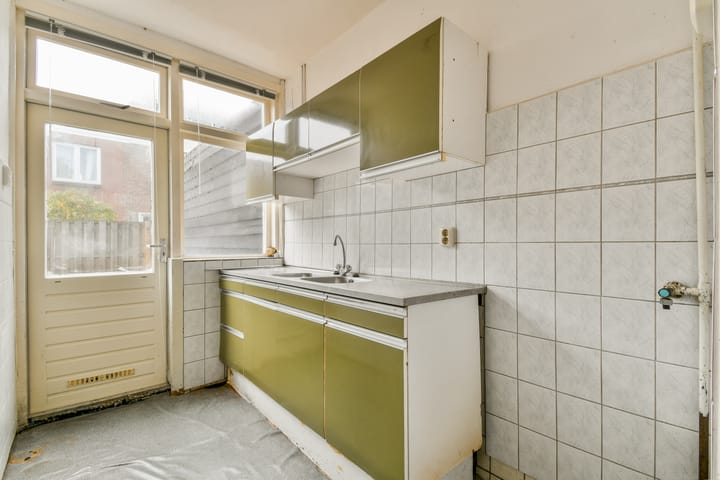 Foto 9 van Djambistraat 26