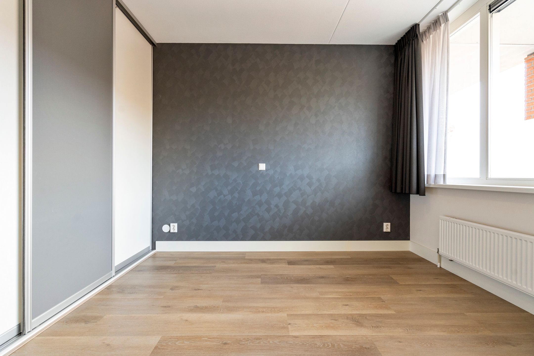 Foto 24 van Raadhuisstraat 107