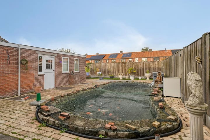 Foto 32 van Spoorstraat 54