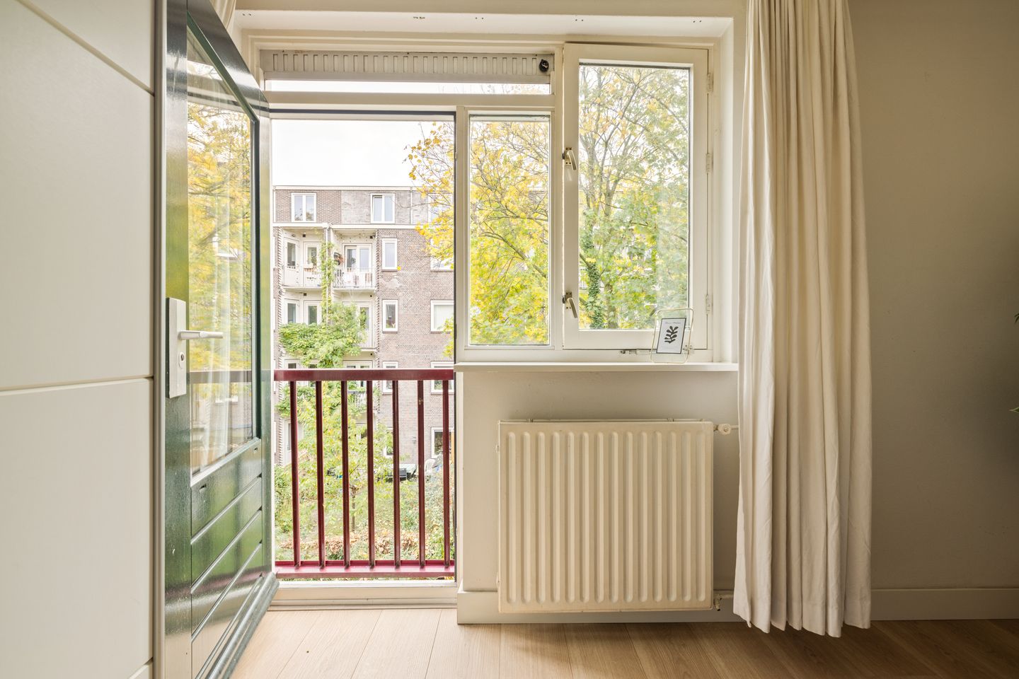 Foto 25 van Menadostraat 39-C