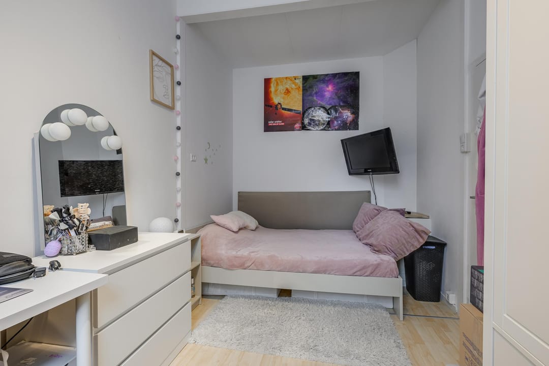 Foto 23 van Warmoezierstraat 12