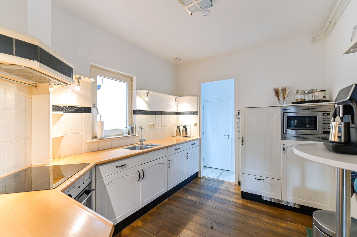 Foto 10 van Baarlosestraat 84