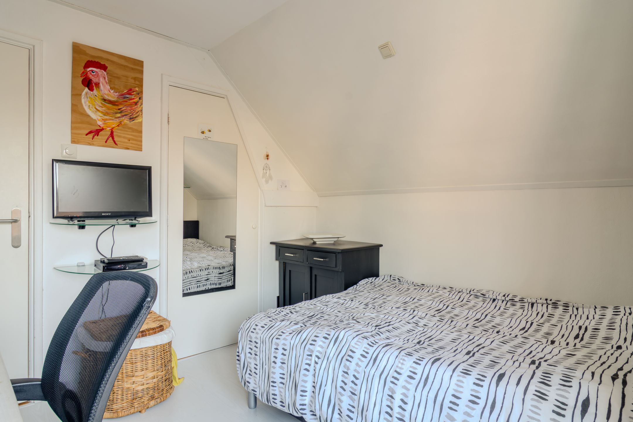 Foto 18 van Raadhuisstraat 12