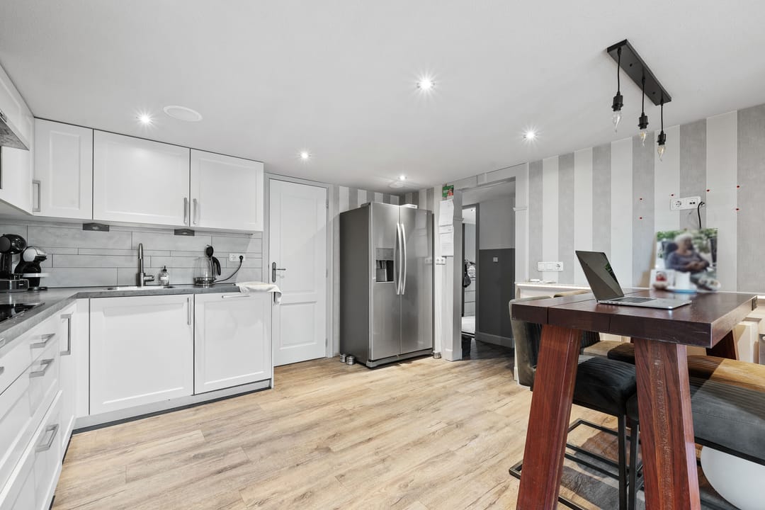 Photo 11 of Ericasestraat 77-A