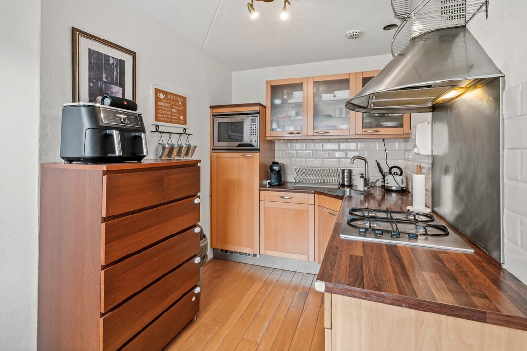 Foto 11 van Damstraat 62-A