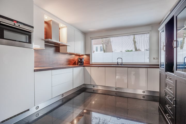 Foto 12 van Slinger 80