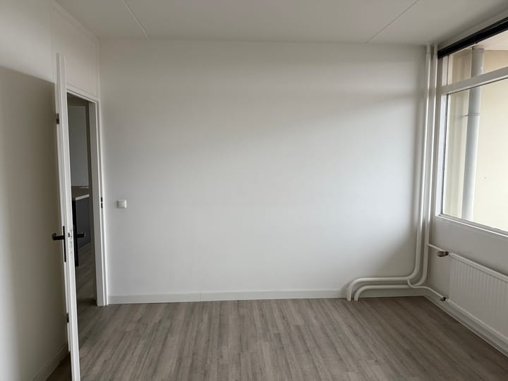 Photo 11 of Heutinkstraat 25