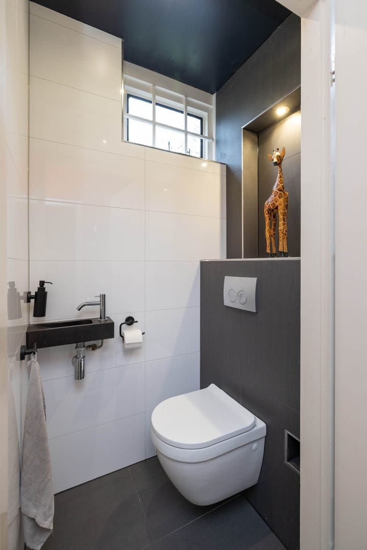 Foto 16 van Van Coeverdenstraat 5