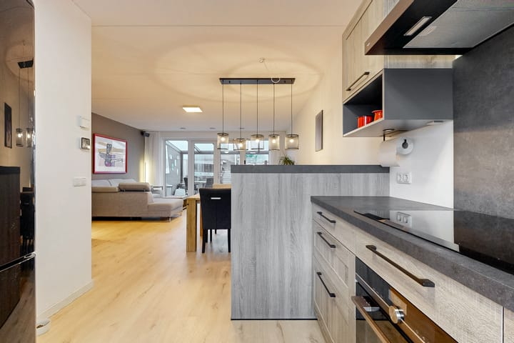 Foto 16 van Weegbree 16