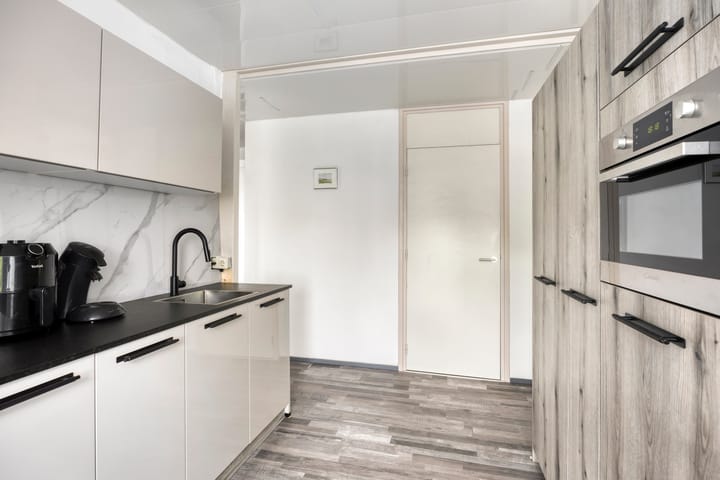 Tussenwoning te koop: Mucherveldstraat 4, Kerkrade