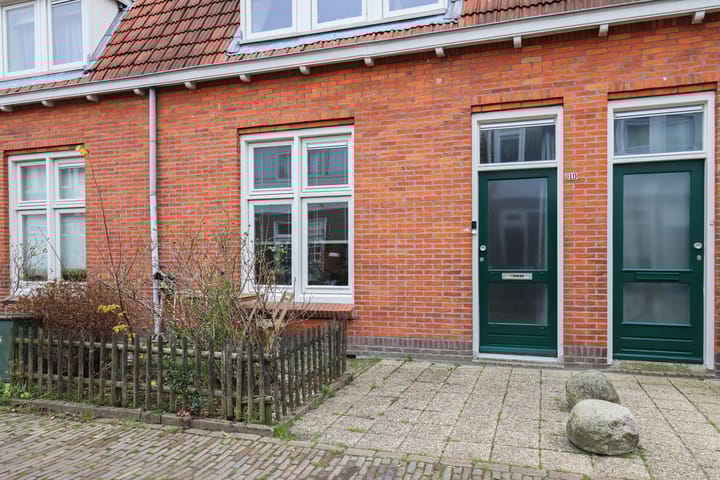 Foto 9 van Warmoezenierstraat 10