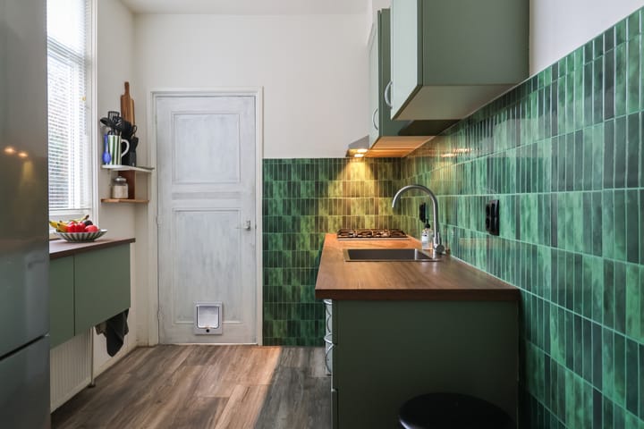 Foto 23 van Warmoezenierstraat 10