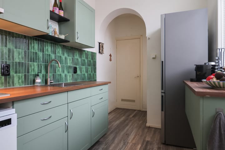 Foto 26 van Warmoezenierstraat 10