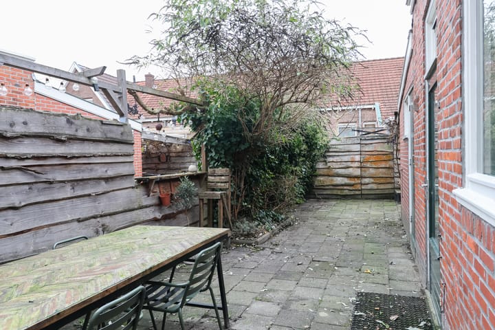 Foto 40 van Warmoezenierstraat 10