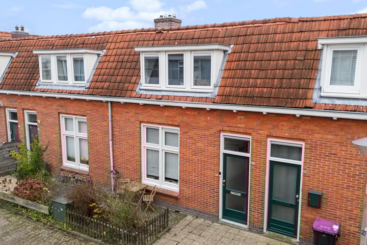 Foto 48 van Warmoezenierstraat 10