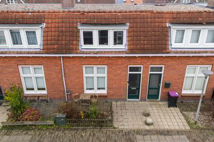 Foto 49 van Warmoezenierstraat 10