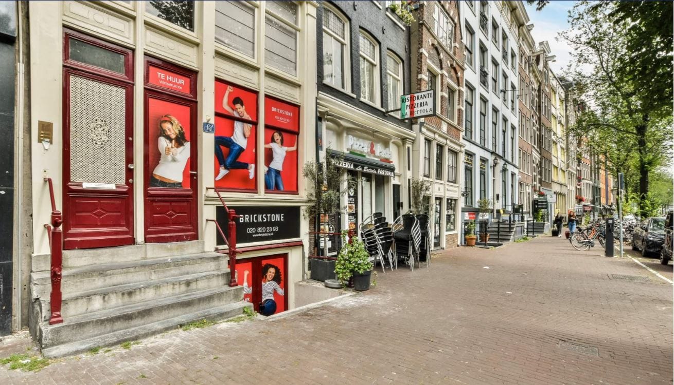 Bekijk foto 1 van Nieuwezijds Voorburgwal 84-H