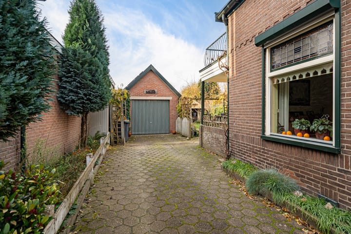 Photo 6 of Tienwoningenweg 18