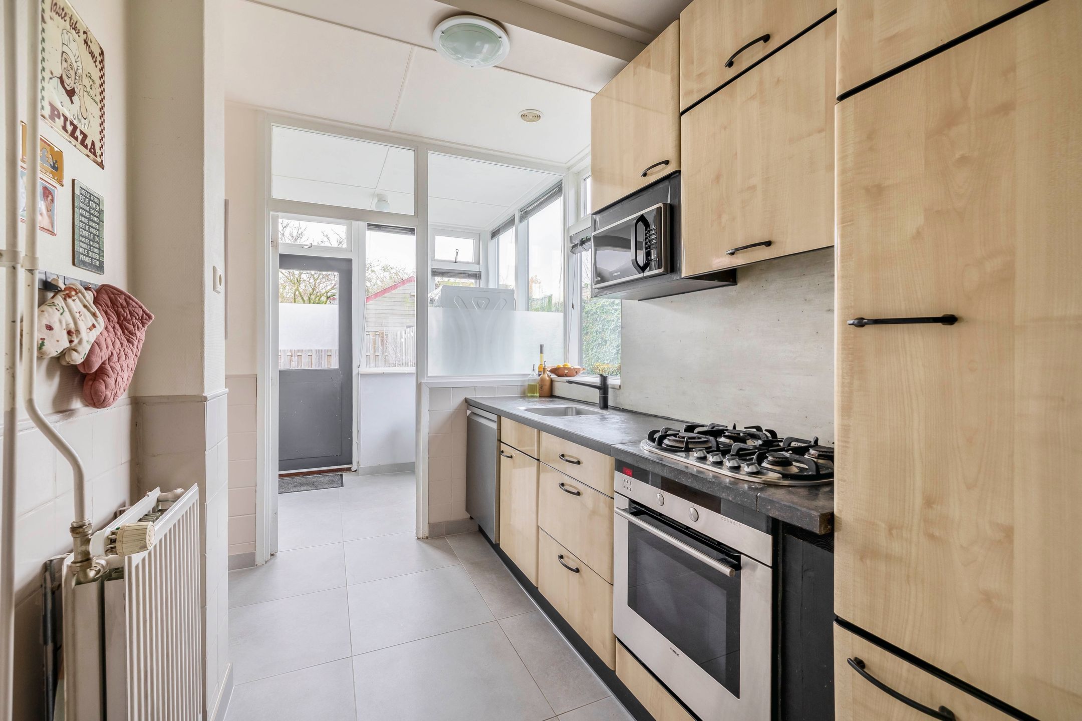 Foto 15 van Raadhuisstraat 14