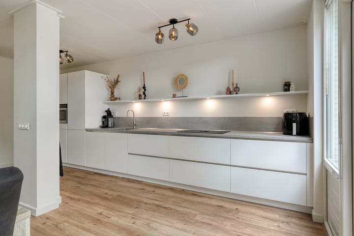 Foto 2 van Warmoeziershof 65