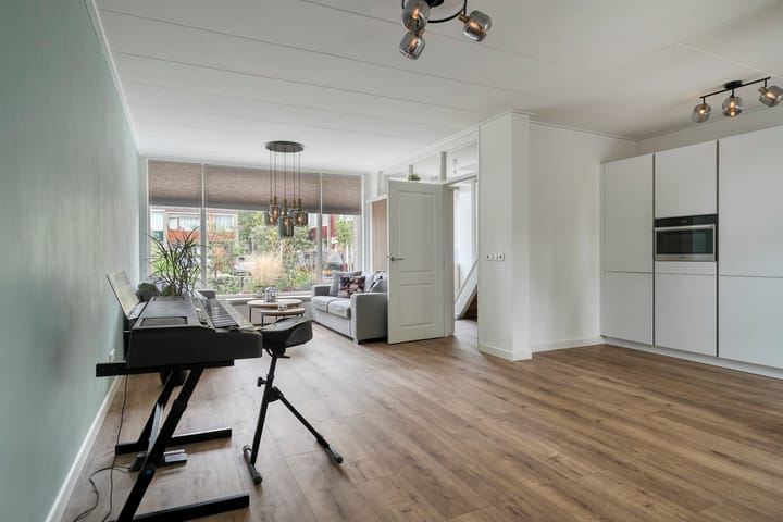 Foto 7 van Warmoeziershof 65