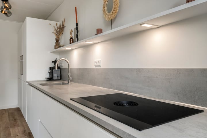 Foto 11 van Warmoeziershof 65