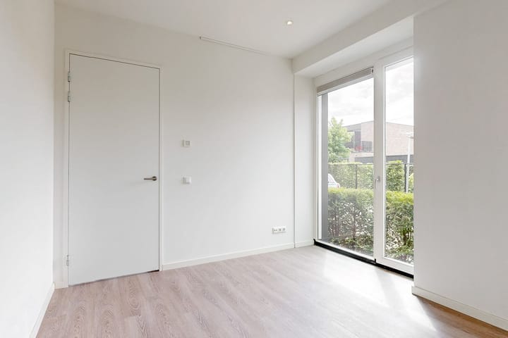 Foto 11 van Julianalaan 15-A4