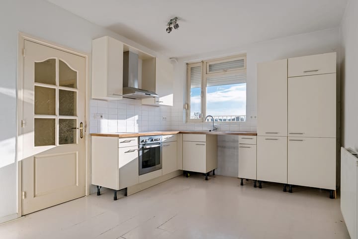 Foto 11 van Kouvenderstraat 52-A