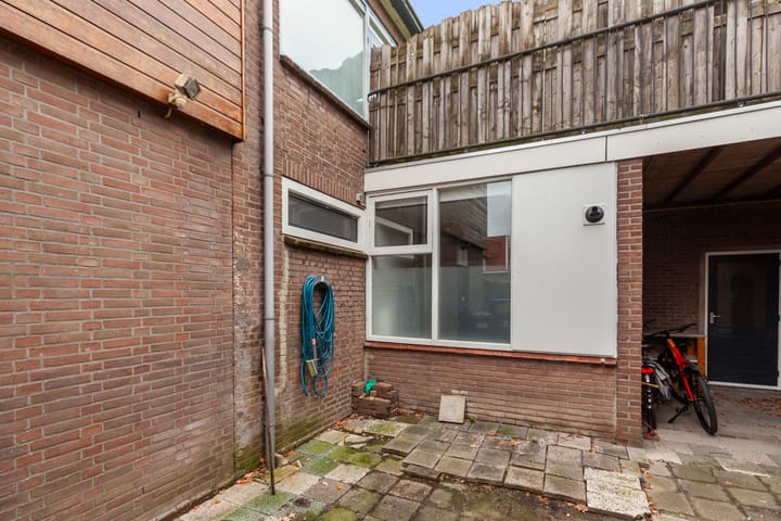 Foto 28 van Damstraat 4