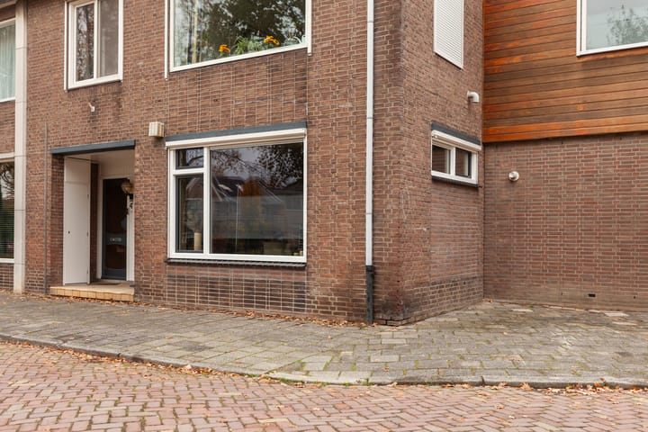 Foto 32 van Damstraat 4