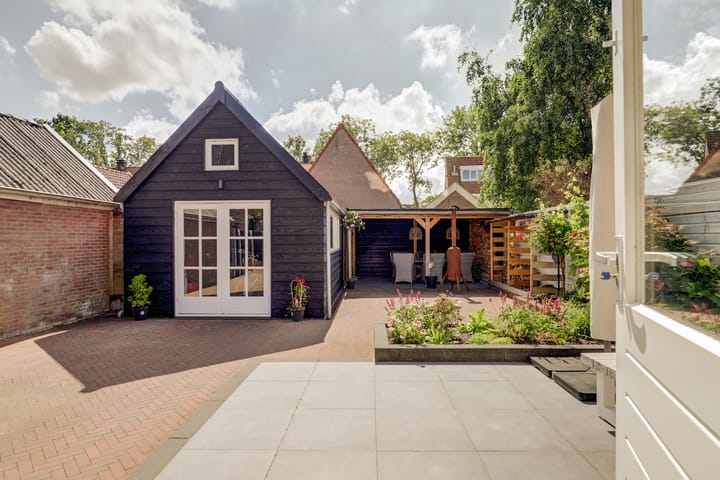 Foto 15 van Tuindorpweg 12