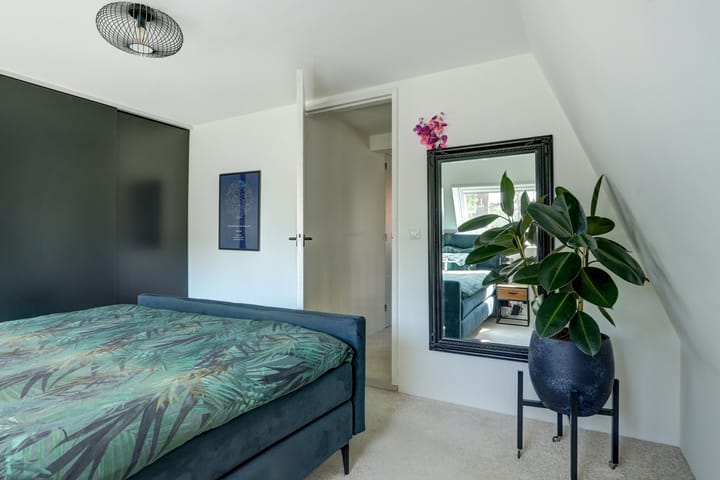 Foto 25 van Tuindorpweg 12