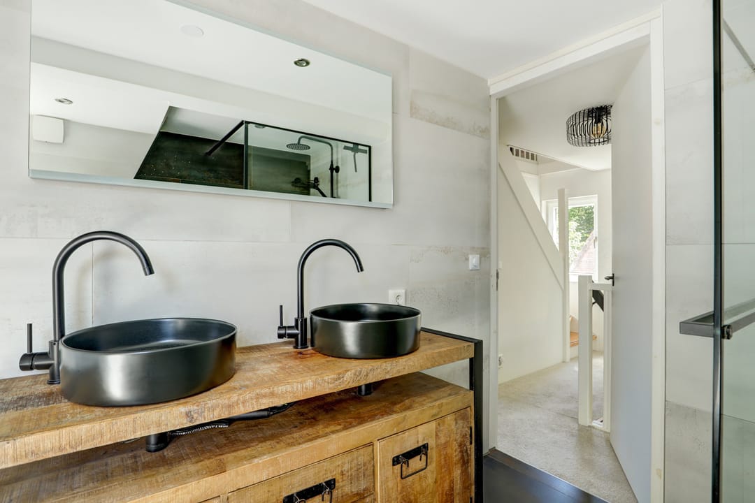 Foto 28 van Tuindorpweg 12