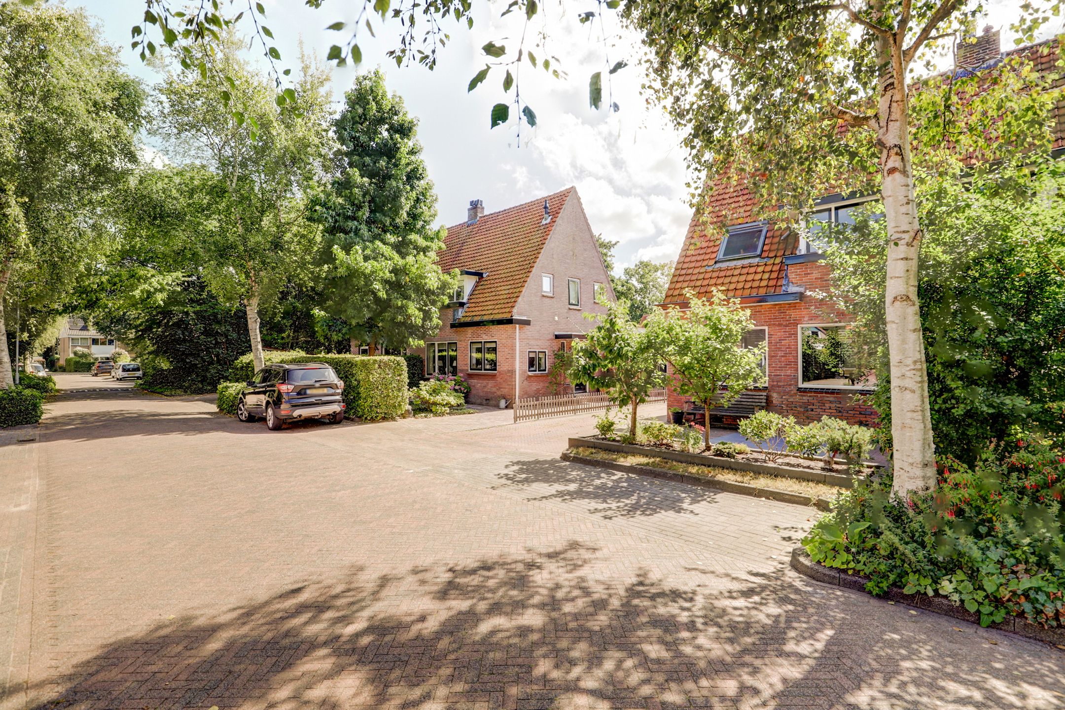 Foto 48 van Tuindorpweg 12