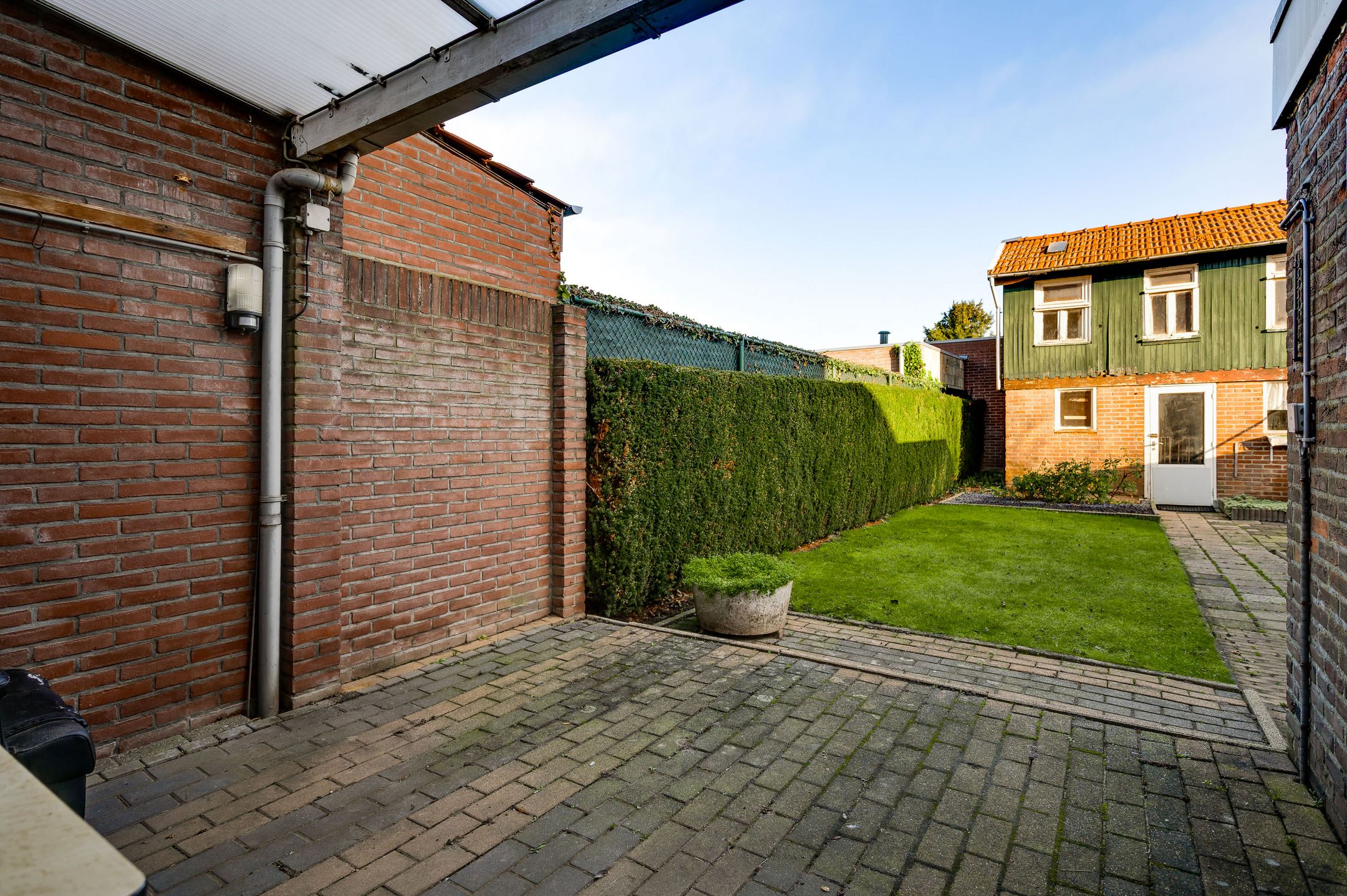 Foto 36 van Vroenhofstraat 1-A