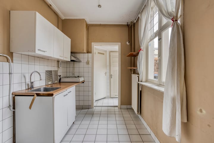 Foto 11 van Kronehoefstraat 36-A