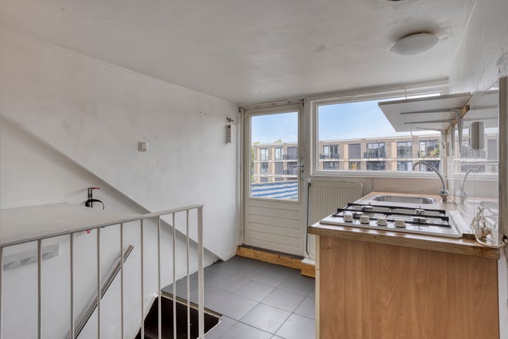 Foto 29 van Kronehoefstraat 36-A