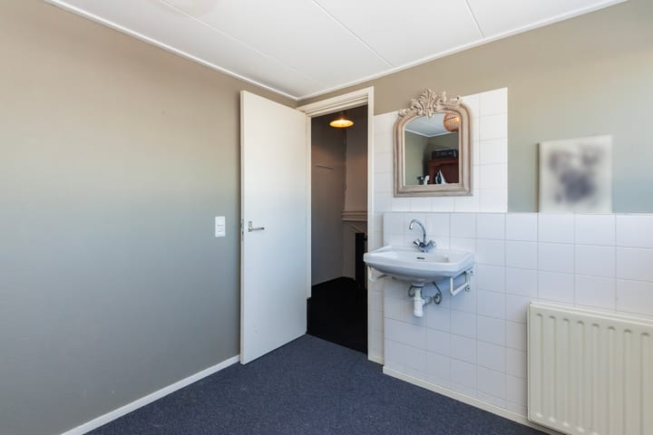 Foto 32 van Brederostraat 47