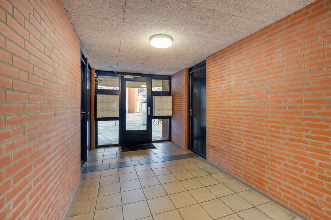 Foto 26 van Damstraat 66-B