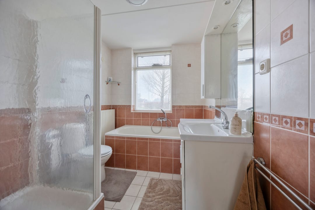 Foto 13 van Makelaar 33