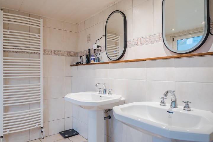 Foto 26 van Raadhuisstraat 64