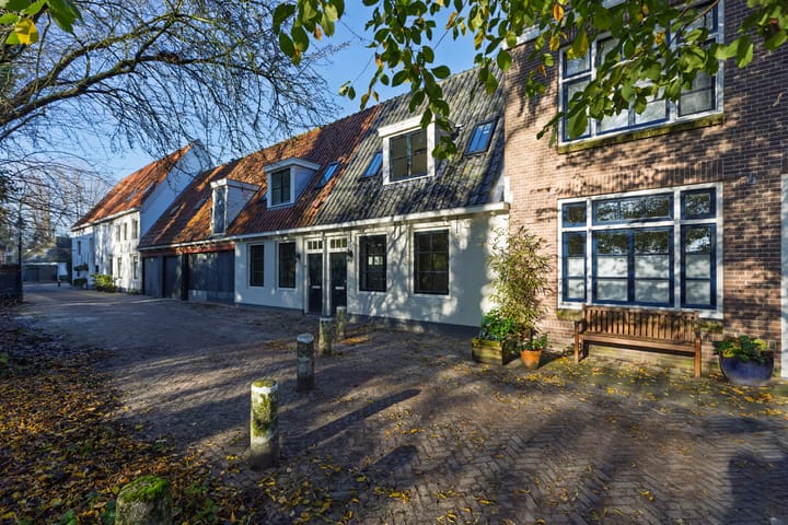 Foto 25 van Wollenweversbuurt 10