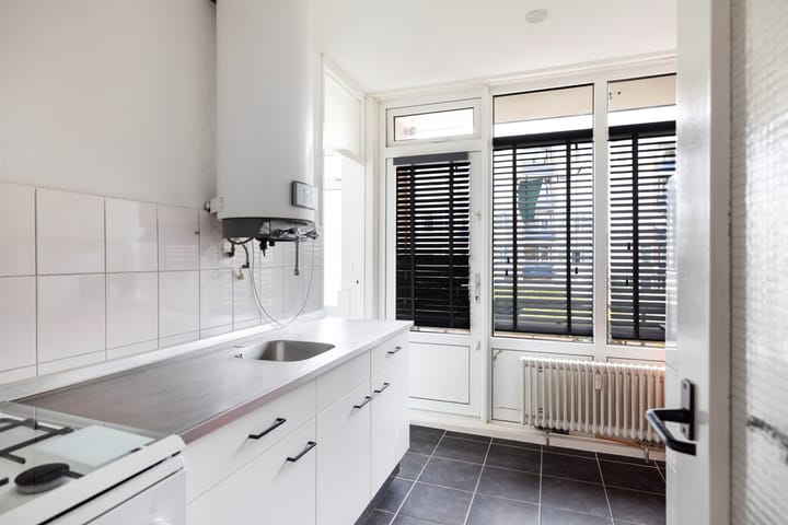 Foto 15 van Douwelerwetering 63